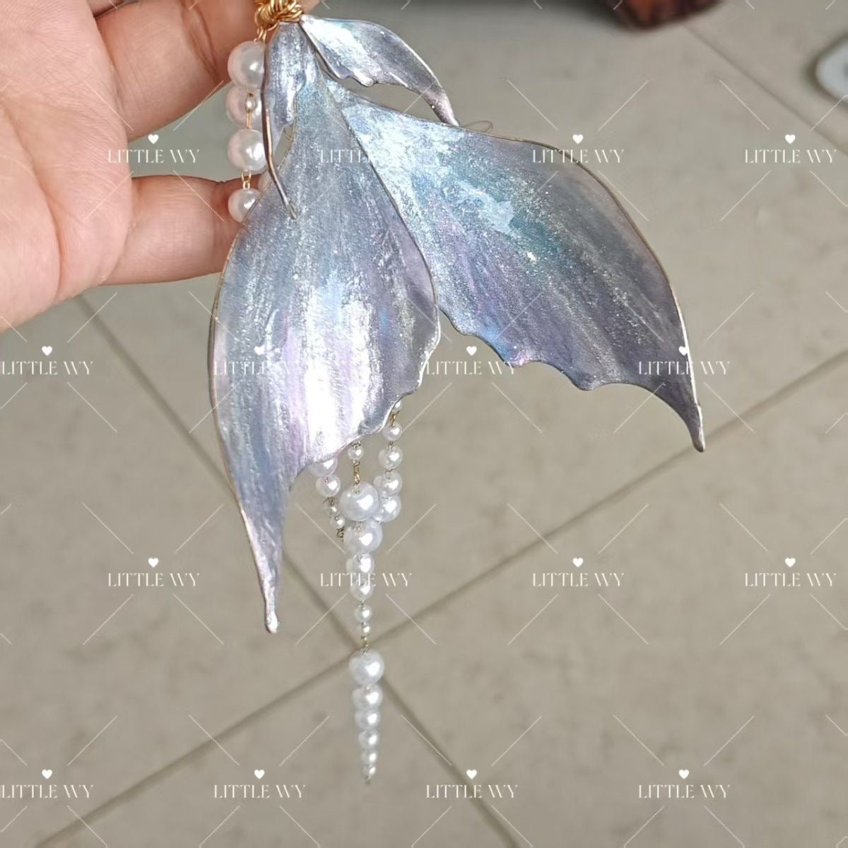 028 LAD Rafayel Lemurian Sea God Bag Charm