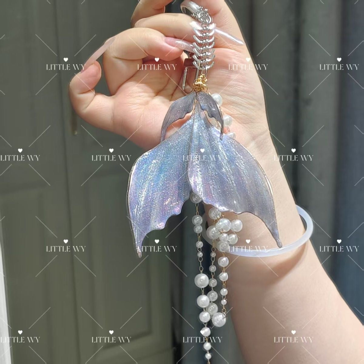 028 LAD Rafayel Lemurian Sea God Bag Charm