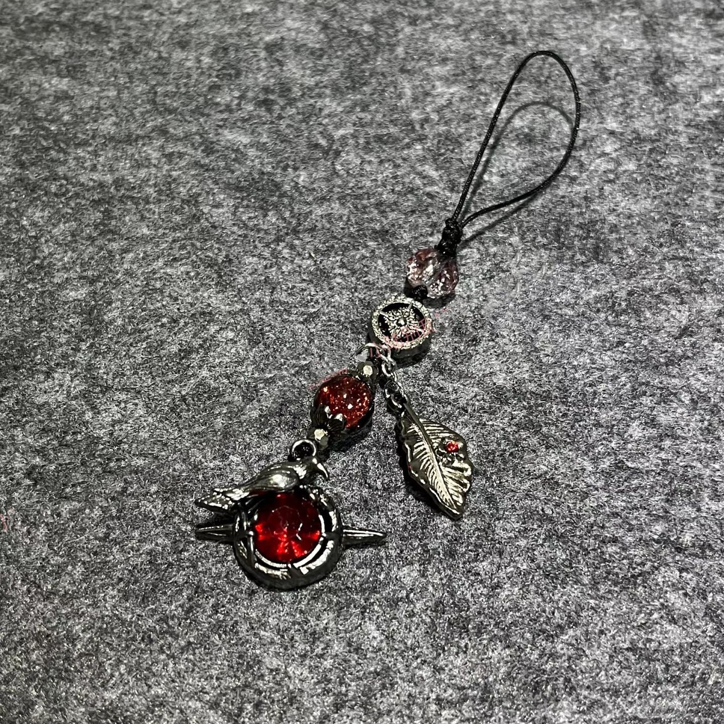 130 Sylus Blood Moon Crow Phone Charm Pendant